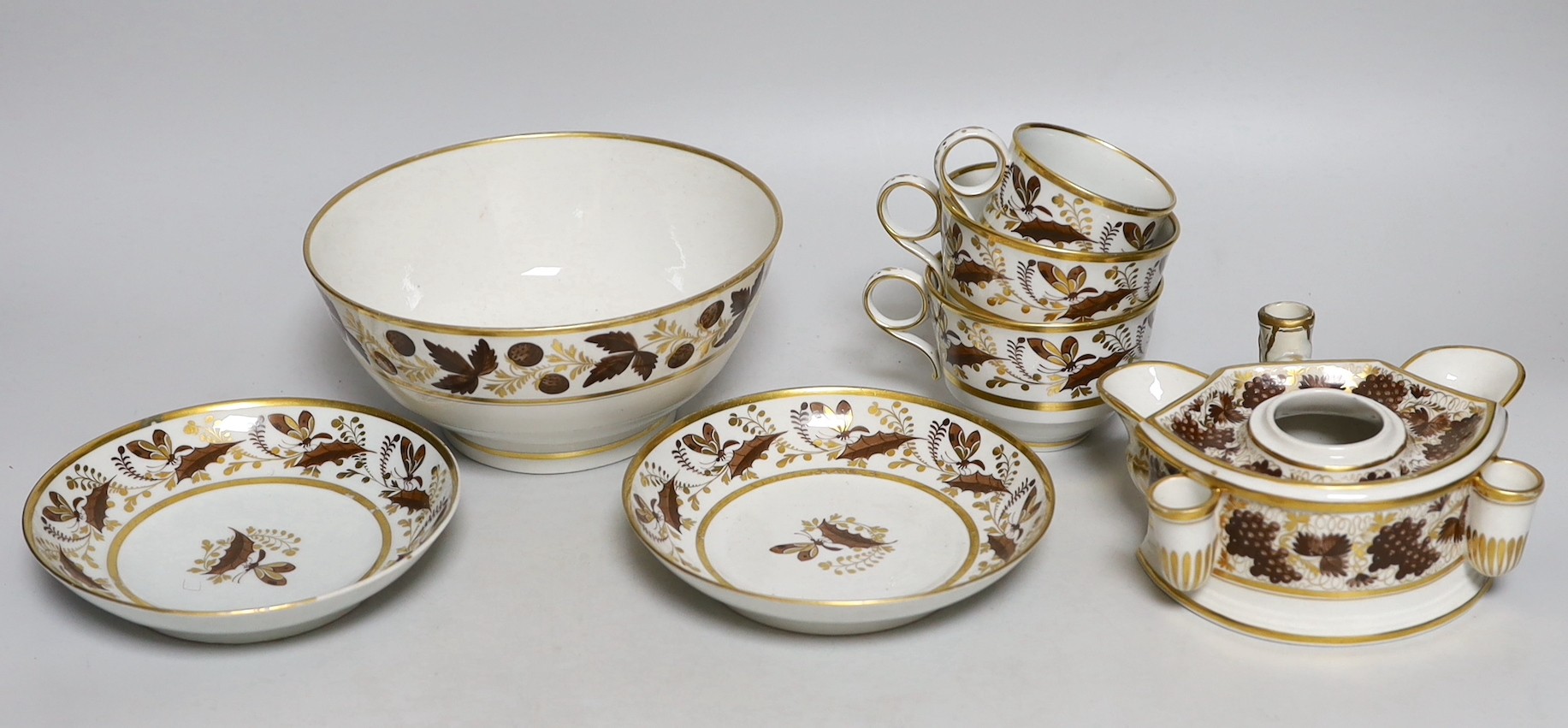 Flight and Barr, Worcester brown enamelled and gilded inkstand, two trios and a similar slops bowl, c.1795, incised B marks